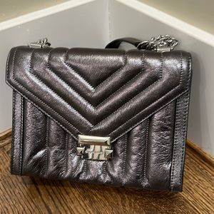 Metallic grey Michael Kors shoulder or cross body handbag.